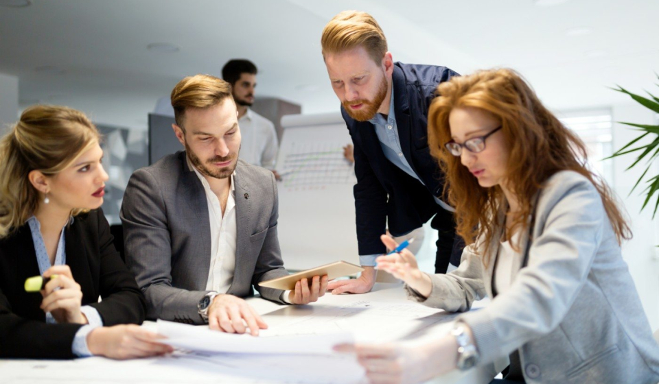 business-people-working-together-on-project-and-B3MZ4TX-min