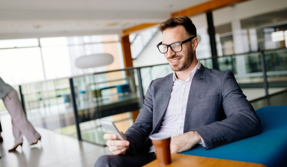 businessman-taking-a-break-with-a-cup-of-coffee-JW4B3DH-min